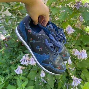 Floral, leather and suede sneakers from Coach